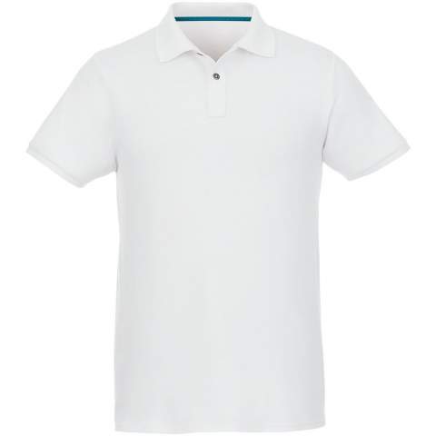 The Beryl short sleeve men's polo is made of 220 g/m² 70% GOTS certified cotton blended with 30% GRS certified recycled polyester, making it a more sustainable option suitable for a variety of occasions and activities. Adding to its sustainability, the polo features GRS certified buttons, further reducing its environmental impact. The flat knit rib cuffs add sophistication and maintain the polo's shape. GOTS certification ensures a 100% certified supply chain from raw material to our printing techniques, making this garment an eco-friendly choice.