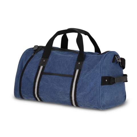 Stylish duffle bag made from recycled cotton canvas. Features 100% recycled reflective webbing, luxurious zips and pulls, and 100% recycled polyester lining. Includes a side grab handle, adjustable removable shoulder strap, 1 side pocket, 2 front pockets, and 3 interior pockets, one with a zip.