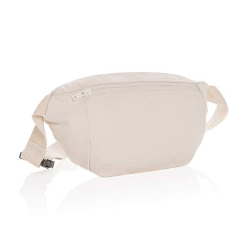 De Impact AWARE™ 285 g/m² gerecyclede canvas heuptas ongeverfd heeft het perfecte ontwerp voor diegenen die meer willen meenemen dan alleen een telefoon en portemonnee. Er past een kleine waterfles en andere benodigdheden in. Het gerecyclede canvas is ongeverfd en gebruikt in zijn ruwe vorm, zonder chemicaliën van verven of bleken. Met AWARE™ tracer die het echte gebruik van gerecyclede materialen valideert. 2% van de opbrengst van elk verkocht Impact-product wordt gedoneerd aan Water.org. Samenstelling 70% gerecycled katoen, 30% gerecycled polyester.<br /><br />PVC free: true