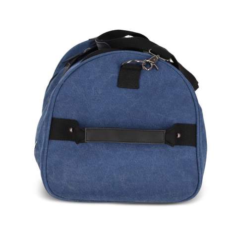 Stylish duffle bag made from recycled cotton canvas. Features 100% recycled reflective webbing, luxurious zips and pulls, and 100% recycled polyester lining. Includes a side grab handle, adjustable removable shoulder strap, 1 side pocket, 2 front pockets, and 3 interior pockets, one with a zip.