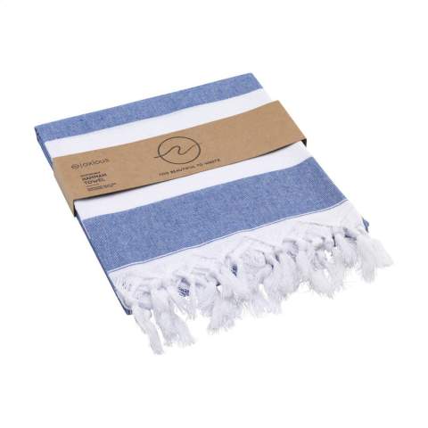 Een multifunctionele hamam handdoek van Oxious. Gemaakt van 50% OEKO-TEX® gecertificeerd katoen en 50% gerecycled industrieel textielafval (140 g/m²). Promo is een heerlijk zacht en stijlvol doek met een wit streeppatroon. Prachtig als shawl, kleed op de bank, luxe (hamam)doek of handdoek. Het doek is handgemaakt.      Deze mooie, zachte doeken worden gemaakt door lokale vrouwen in een klein dorpje in Turkije. Zij werken daar in een sociale context, met ruimte voor groei en ontwikkeling. De doeken zijn handgemaakt met liefde en zorg voor het milieu. Met een product uit de Oxious collectie kan het pure genieten beginnen. Optioneel: Per stuk in kraft envelop en/of met kraft sleeve.