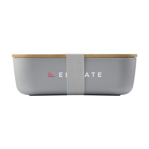 Generously sized lunch box made from PP plastic.  It has a bamboo lid that closes perfectly thanks to the silicone edge on the bottom. An elastic strap ensures that the lid stays in place on the go. Not dishwasher-safe.     NOTE: Due to the natural grains and contours of bamboo, we cannot guarantee consistency in depth/colour of the engraving.