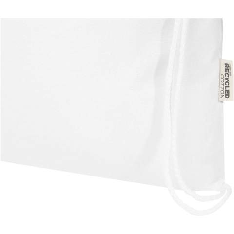 Le sac avec cordon de serrage Oregon Blend, fabriqué à partir de 60 % de coton recyclé certifié GRS et de 40 % de RPET certifié GRS, est le cadeau idéal à distribuer pour promouvoir votre marque ou votre campagne marketing. Ce sac léger est peu coûteux, facile à porter sur le dos ou sur l'épaule et offre suffisamment d'espace pour ajouter un logo, slogan ou autre message. Le cordon de serrage permet de l'ouvrir et de le fermer facilement, et le coton de 140 g/m² est solide et durable. Grand compartiment principal avec fermeture à cordon en coton. Les méthodes d'impression disponibles pour ce sac shopping sont également certifiées GRS, ce qui garantit que l'ensemble de la chaîne d'approvisionnement est transparente et certifiée. Fabriqué en Inde. Capacité de charge maximale de 5 kg. Capacité : 5 litres.