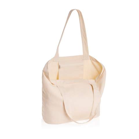 The Impact AWARE™ 240gsm recycled canvas shopper with pocket undyed is the perfect way to carry your essentials wherever you go. This spacious shopper provides sufficient space for all your daily needs. Including a small inner pocket. The recycled canvas is undyed and used in its raw form, without chemicals from dyeing or bleaching. With AWARE™ tracer that validates the genuine use of recycled materials. 2% of proceeds of each Impact product sold will be donated to Water.org. Composition 70% recycled cotton, 30% recycled polyester.<br /><br />PVC free: true