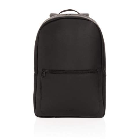 Take your commuting style up a notch with this structured backpack made with soft PU in a clean and sleek style with tonal zippers. The backpack features a top zip closure, top carrying handle, adjustable shoulder straps, external zip pocket, interior zip pocket, luggage strap and a 15.6 inch laptop pocket. Exterior 100% PU, interior 100% 210D polyester. PVC free.<br /><br />FitsLaptopTabletSizeInches: 15.6<br />PVC free: true