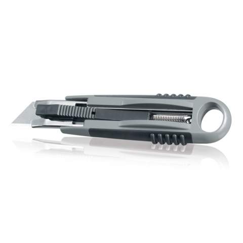 Cutter in soft touch grey/black case, blade retracts automatically.
