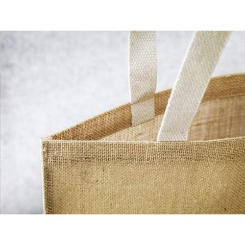 WoW! Tough, durable jute shopping bag with laminated interior and long woven cotton handles. Capacity approx. 8 litres.   For information: due to the coarseness of the fabric, the ability to imprint small details of a logo, thin lines and small letters is limited. We may therefore, after receiving your logo, advise you to adjust or enlarge the logo.