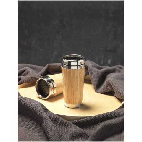 Double-walled insulated tumbler made from stainless steel and finished with a natural bamboo outer. It can keep drinks hot for up to 2 hours and cold for up to 4 hours. Drinking from it is easy with the press-on lid with sliding cover to close.