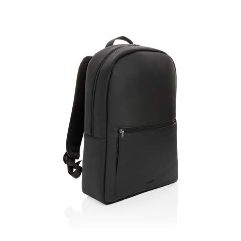 Take your commuting style up a notch with this structured backpack made with soft PU in a clean and sleek style with tonal zippers. The backpack features a top zip closure, top carrying handle, adjustable shoulder straps, external zip pocket, interior zip pocket, luggage strap and a 15.6 inch laptop pocket. Exterior 100% PU, interior 100% 210D polyester. PVC free.<br /><br />FitsLaptopTabletSizeInches: 15.6<br />PVC free: true