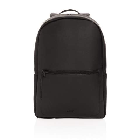Take your commuting style up a notch with this structured backpack made with soft PU in a clean and sleek style with tonal zippers. The backpack features a top zip closure, top carrying handle, adjustable shoulder straps, external zip pocket, interior zip pocket, luggage strap and a 15.6 inch laptop pocket. Exterior 100% PU, interior 100% 210D polyester. PVC free.<br /><br />FitsLaptopTabletSizeInches: 15.6<br />PVC free: true